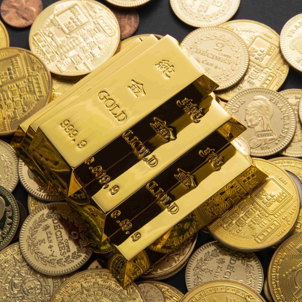 closeup-shot-pile-shiny-gold-coins-bars (1)